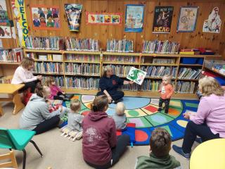Firefighter Michelle reading at Story Time